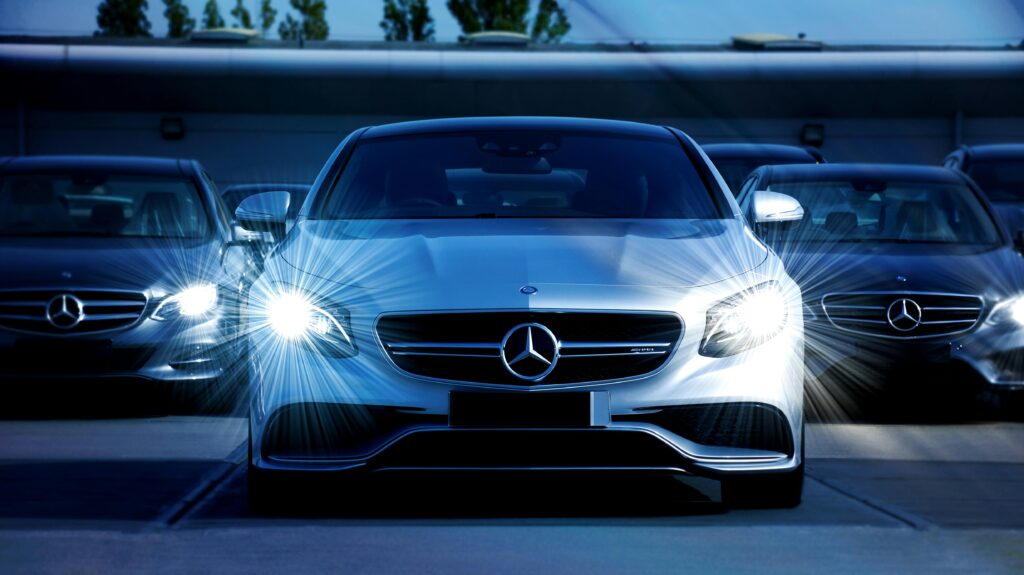 pexels-photo-120049-120049 Front view of a lineup of Mercedes-Benz cars with bright headlights, showcasing luxury and elegance.